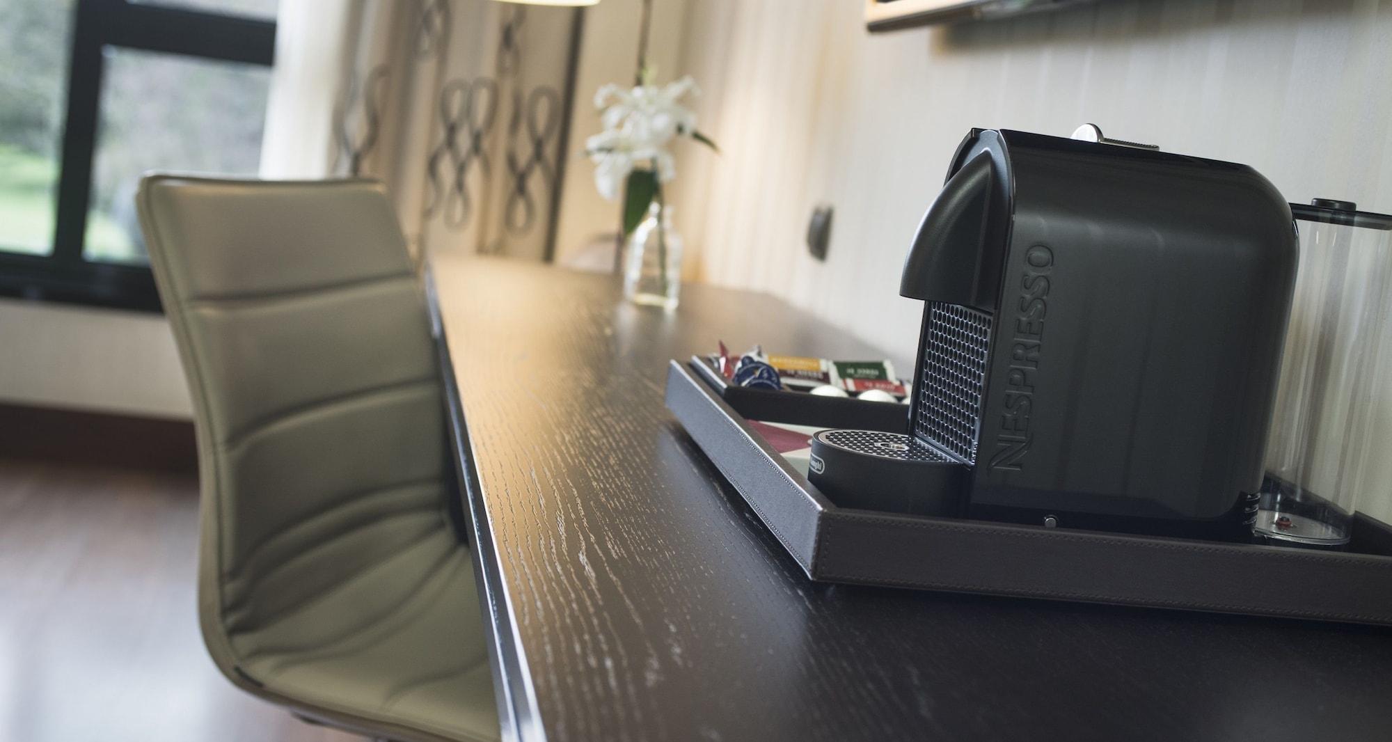 Palacio De Aviles Affiliated By Melia Dış mekan fotoğraf A Nespresso machine in a hotel