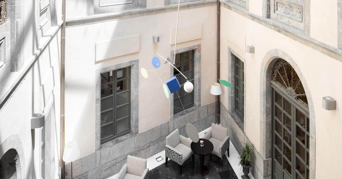 Palacio De Aviles Affiliated By Melia Dış mekan fotoğraf The mobile in the lobby of the National Gallery of Greece