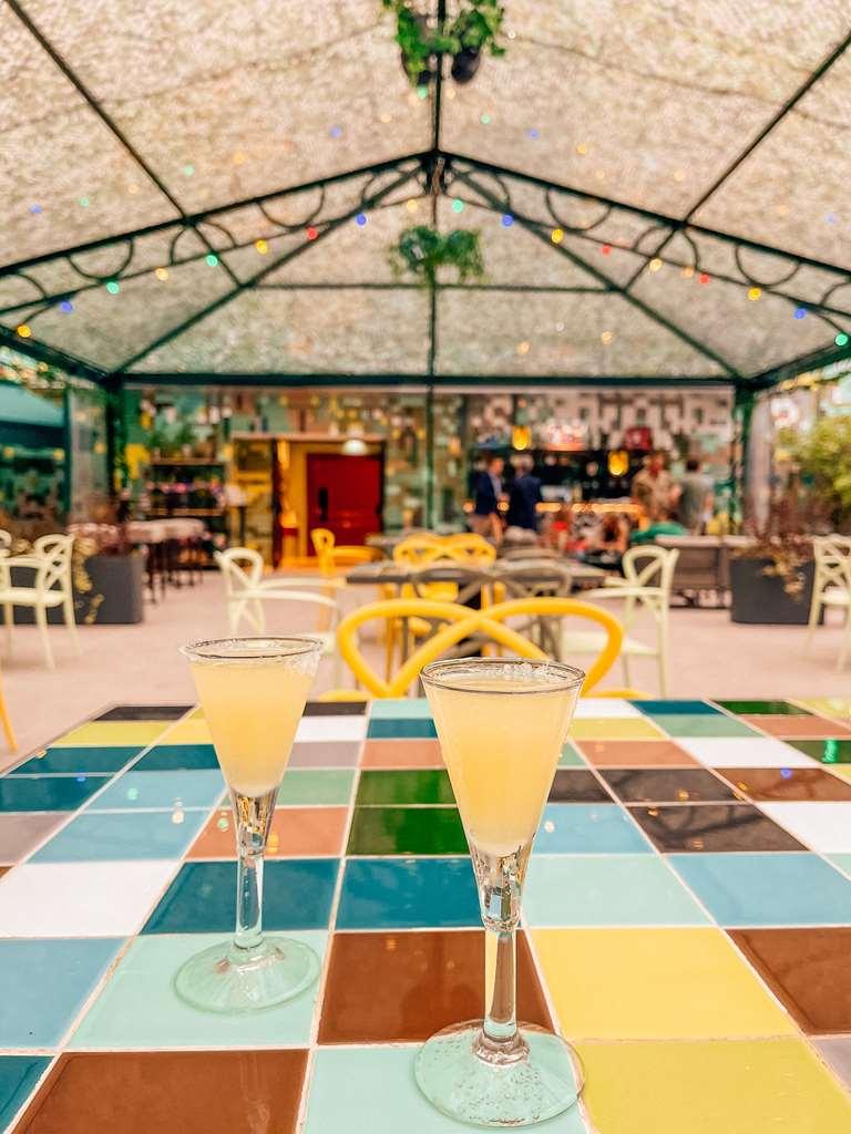 Palacio De Aviles Affiliated By Melia Restoran fotoğraf Two glasses of lemon liqueur